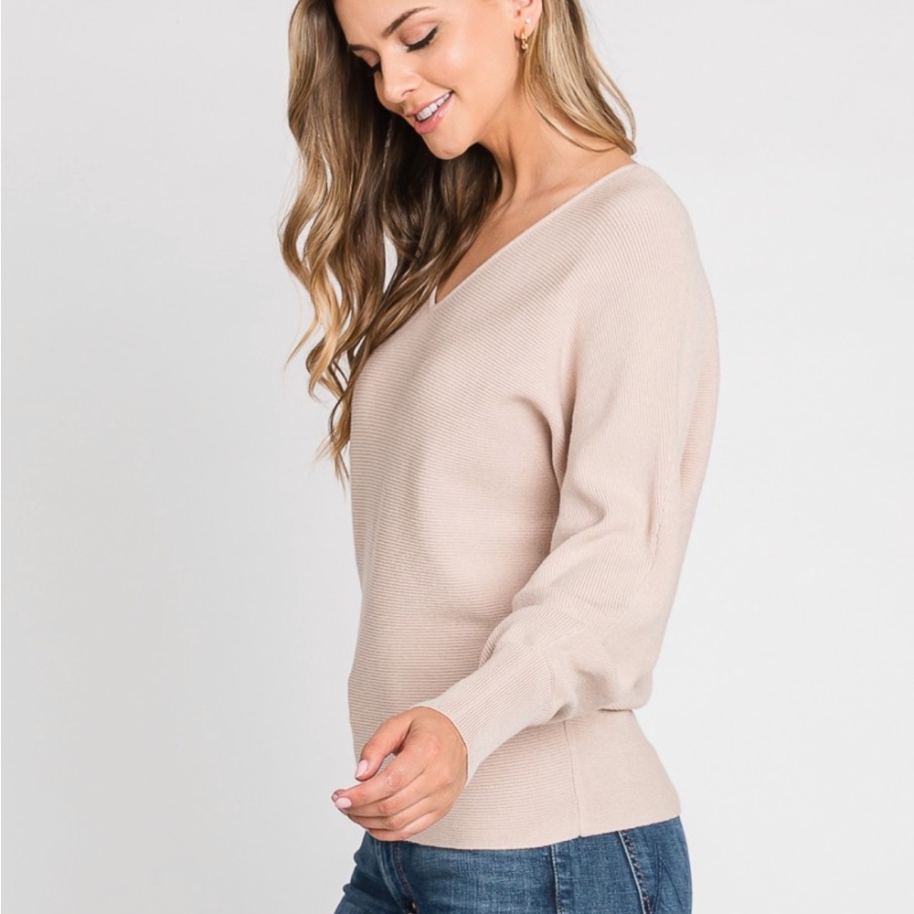 Cream colored V neck sweater